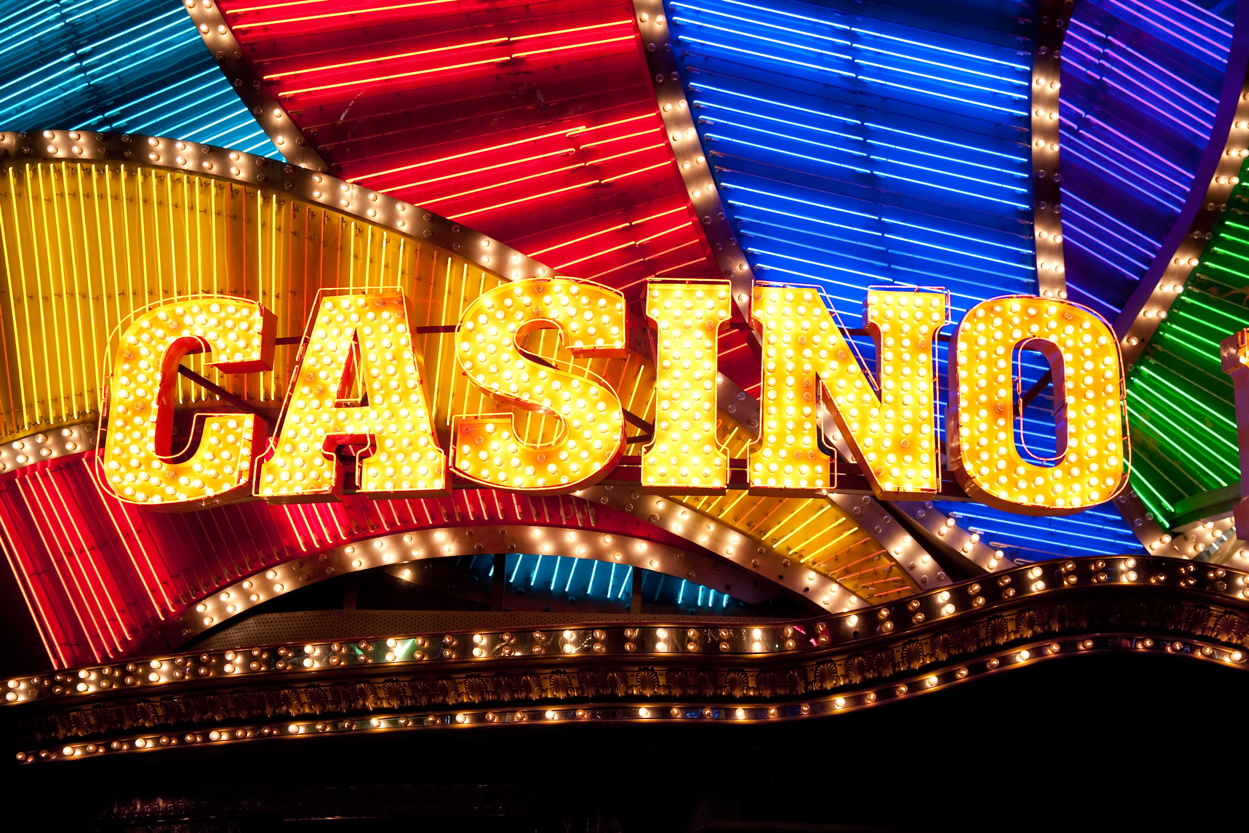 A collage of different online casino logos that offer no deposit bonuses.