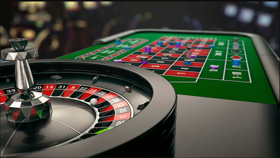 A person on their laptop, Browse a list of no deposit bonus casino offers.